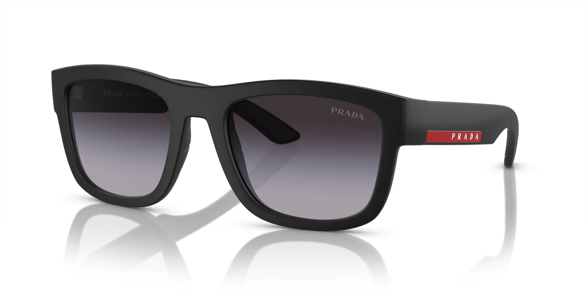 Occhiali da sole Prada Linea Rossa PS 01ZS (1BO09U) colore nero opaco forma quadrato lenti sfumato grigio