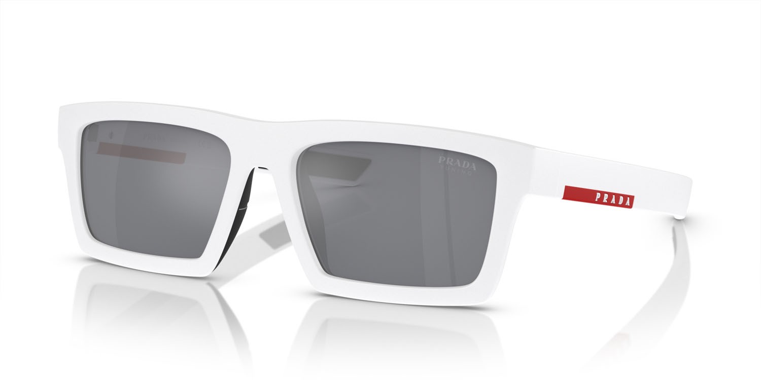 Occhiali da sole Prada Linea Rossa PS 02ZSU (17S40A) colore matte white/black rubber forma rettangolare lenti azzurro specchiato argento