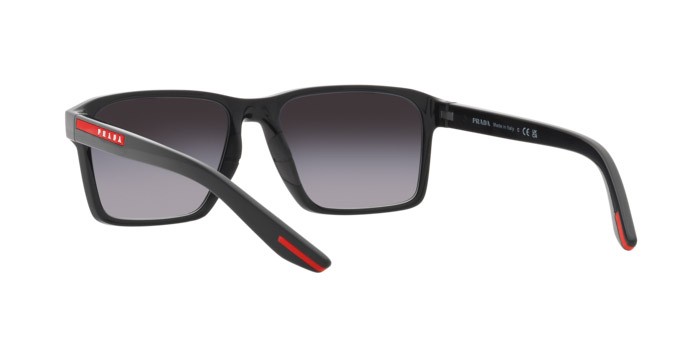 Occhiali da sole Prada Linea Rossa PS 05YS (1AB09U) colore nero forma rettangolare lenti sfumato grigio
