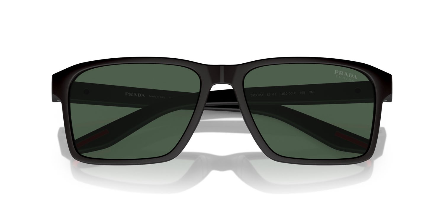 Occhiali da sole Prada Linea Rossa PS 05YS (DG006U) colore nero effetto gommato forma rettangolare lenti tuning dark green