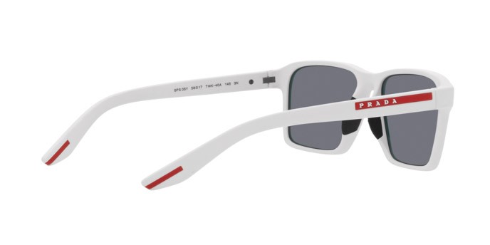 Occhiali da sole Prada Linea Rossa PS 05YS (TWK40A) colore bianco effetto gommato forma rettangolare lenti azzurro specchiato argento