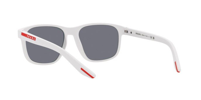 Occhiali da sole Prada Linea Rossa PS 06YS (TWK40A) colore bianco effetto gommato forma quadrato lenti azzurro specchiato argento