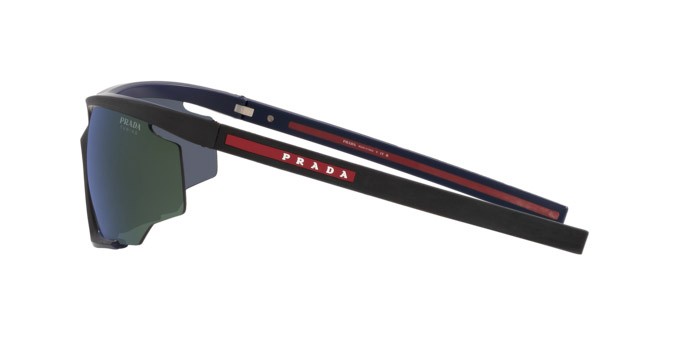 Occhiali da sole Prada Linea Rossa PS 07YS (13K05U) colore nero/rosso effetto gommato forma irregolare lenti blu specchiato