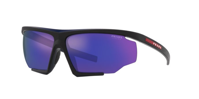 Occhiali da sole Prada Linea Rossa PS 07YS (13K05U) colore nero/rosso effetto gommato forma irregolare lenti blu specchiato