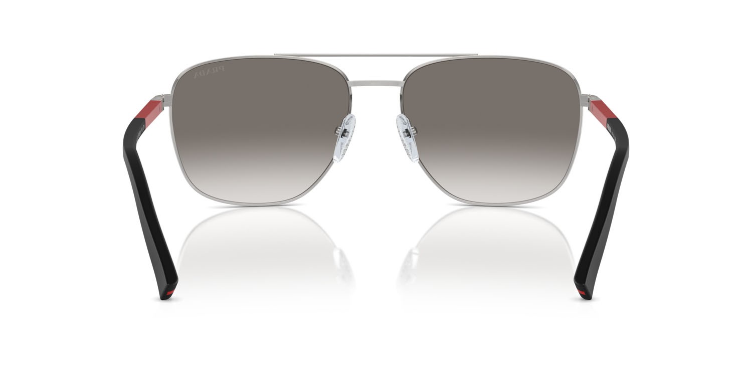 Occhiali da sole Prada Linea Rossa PS 54ZS (1BC02M) colore argento forma ovale lenti grigio sfumato specchiato argento