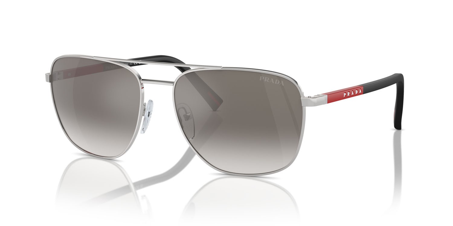 Occhiali da sole Prada Linea Rossa PS 54ZS (1BC02M) colore argento forma ovale lenti grigio sfumato specchiato argento