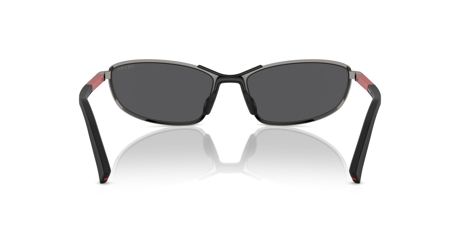 Occhiali da sole Prada Linea Rossa PS 55ZS (5AV07G) colore gunmetal forma irregolare lenti grigio nero specchiato