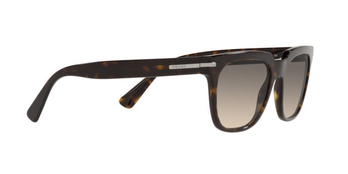 Occhiali da sole Prada PR 04YS (2AU718) colore tortoise forma quadrato lenti clear gradient grey