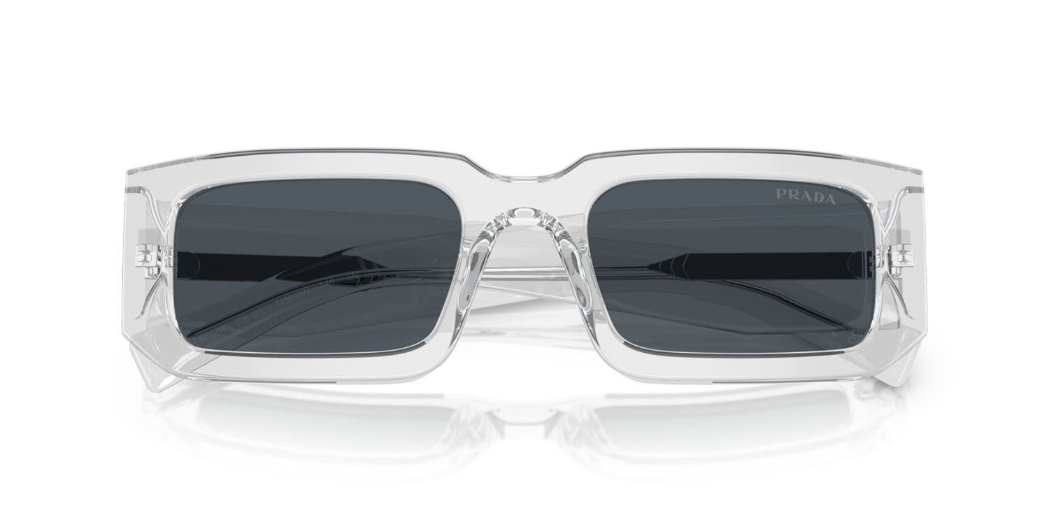 Occhiali da sole Prada PR 06YS (12R09T) colore grigio trasparente forma rettangolare lenti grigio scuro