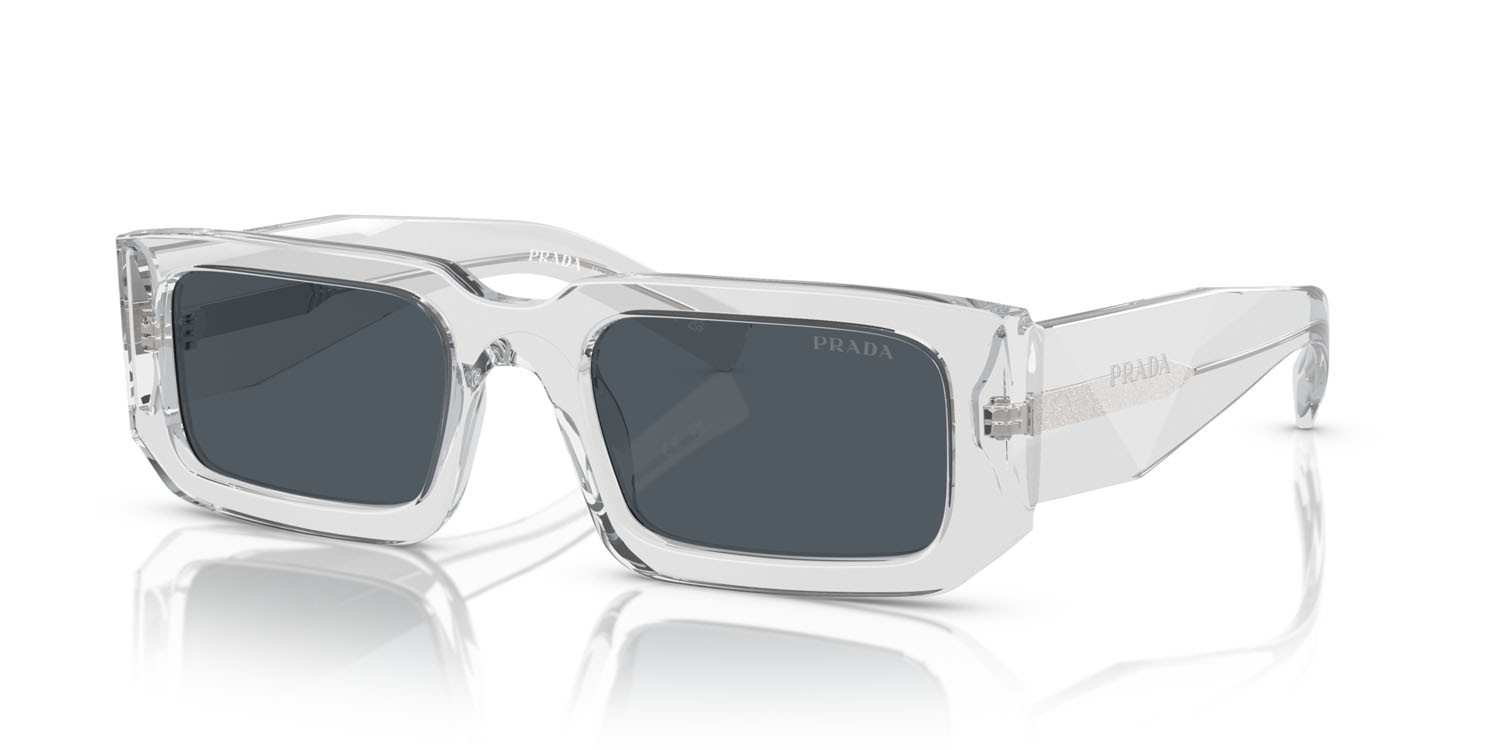 Occhiali da sole Prada PR 06YS (12R09T) colore grigio trasparente forma rettangolare lenti grigio scuro