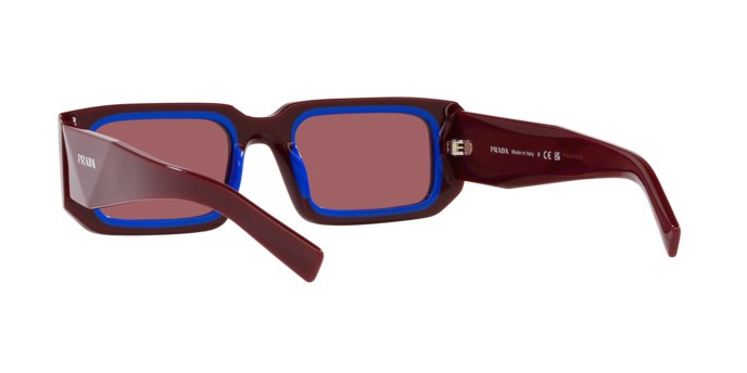 Occhiali da sole Prada PR 06YS (16M08S) colore etruscan/blue forma rettangolare lenti violetto scuro