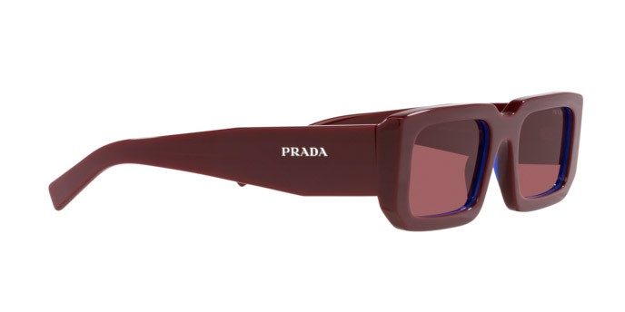 Occhiali da sole Prada PR 06YS (16M08S) colore etruscan/blue forma rettangolare lenti violetto scuro