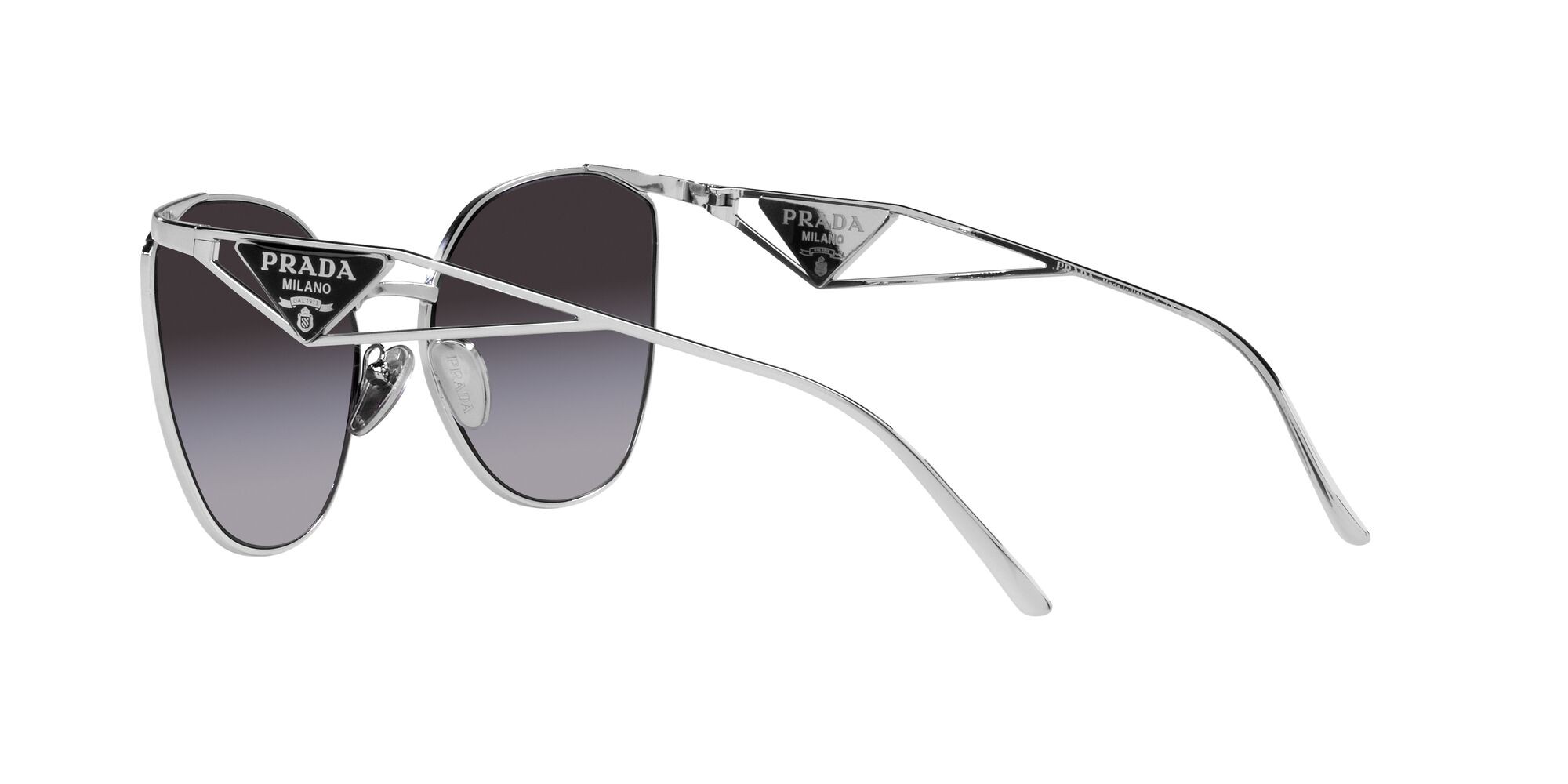 Sunglasses Prada PR 50ZS (1BC09S) color argento shape irregular lenses sfumato grigio