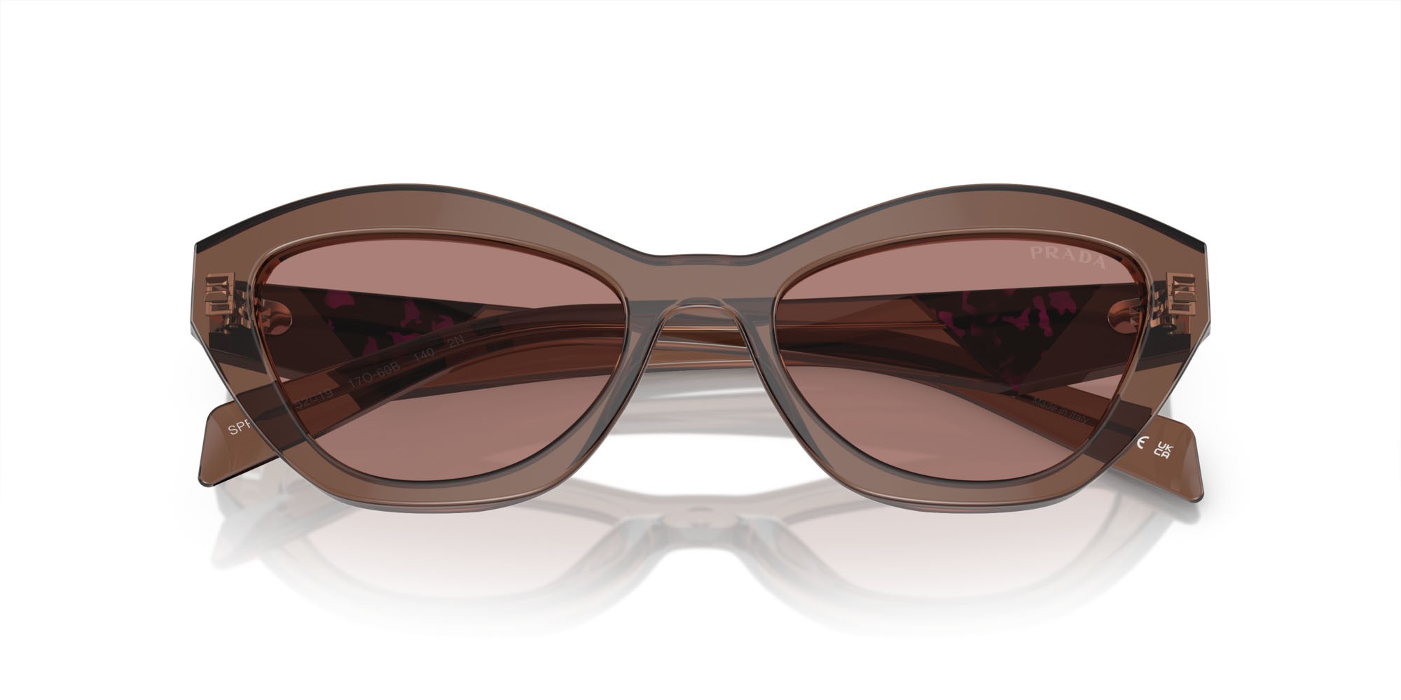 Occhiali da sole Prada PR A02S (17O60B) colore marrone trasparente forma farfalla lenti marrone chiaro