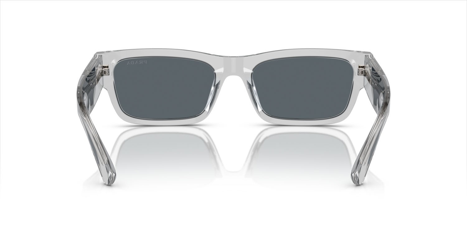 Occhiali da sole Prada PR A03S (17P0A9) colore grigio crystal forma rettangolare lenti blu