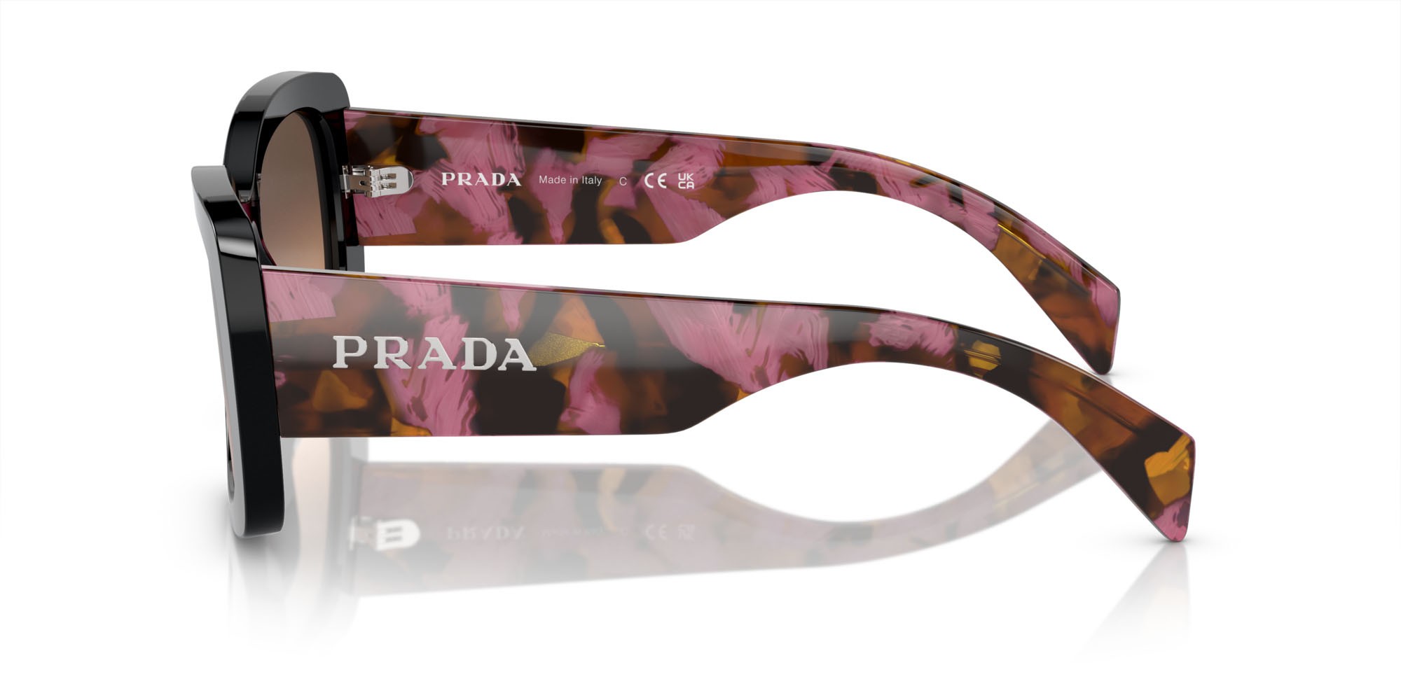 Occhiali da sole Prada PR A08S (12O50C) colore mogano forma ovale lenti marrone sfumato grigio