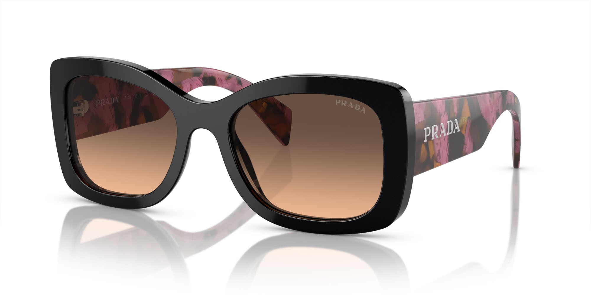 Occhiali da sole Prada PR A08S (12O50C) colore mogano forma ovale lenti marrone sfumato grigio