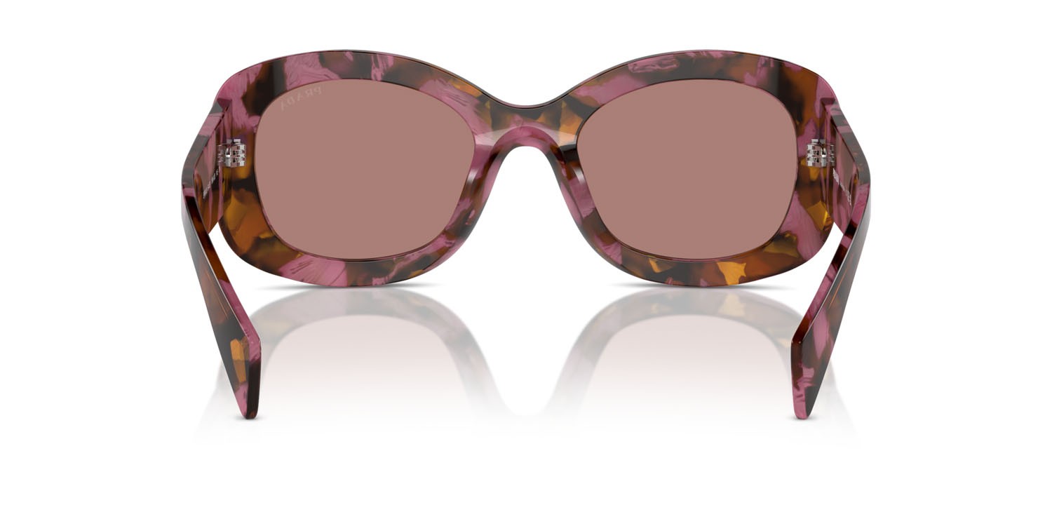 Occhiali da sole Prada PR A13S (18N10D) colore begonia cognac tartarugato forma ovale lenti marrone chiaro