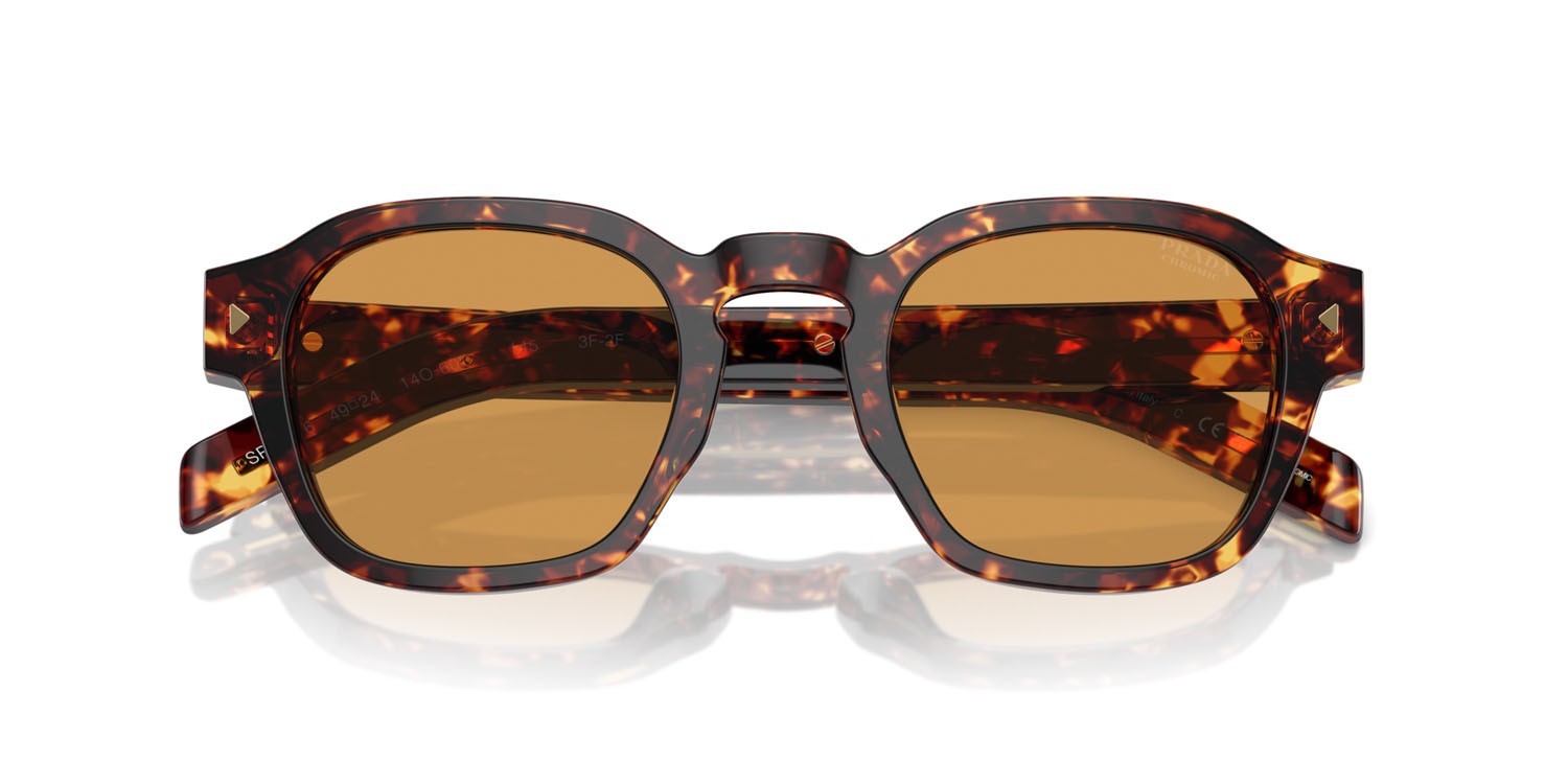 Occhiali da sole Prada PR A16S (14O60F) colore magma tortoise forma pantos lenti fotocromatica marrone chiaro