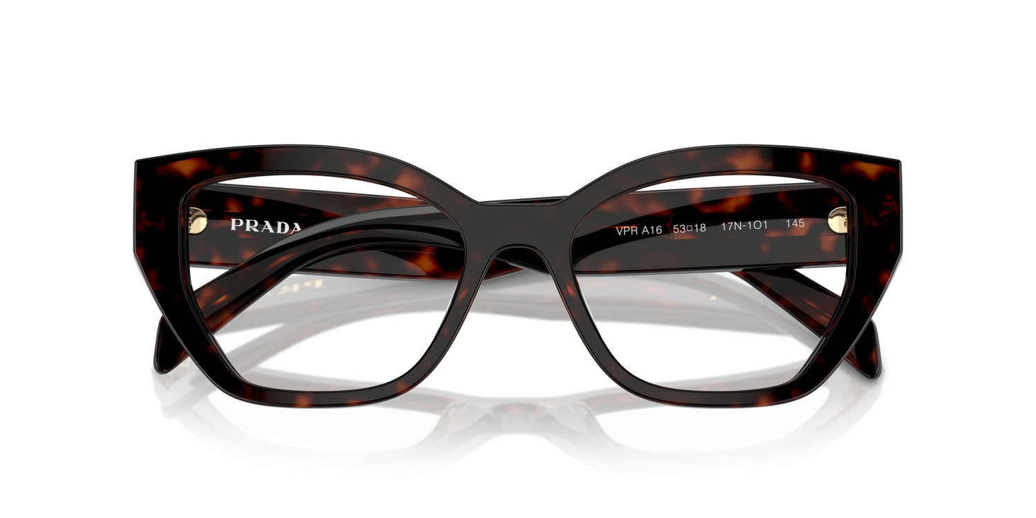 Occhiali da vista Prada PR A16V (17N1O1) colore root tortoise forma irregolare lenti lente demo
