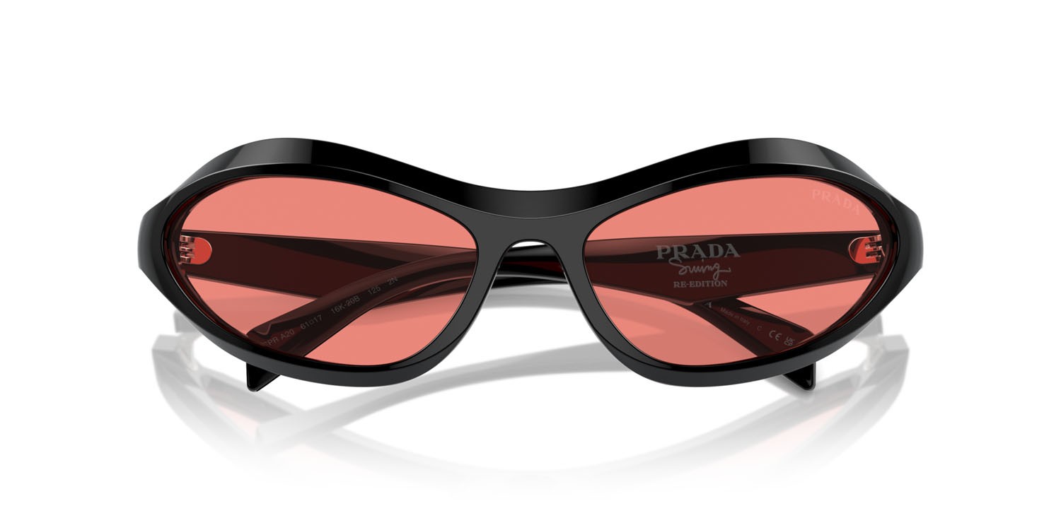 Occhiali da sole Prada PR A20S (16K20B) colore nero forma irregolare lenti rosa