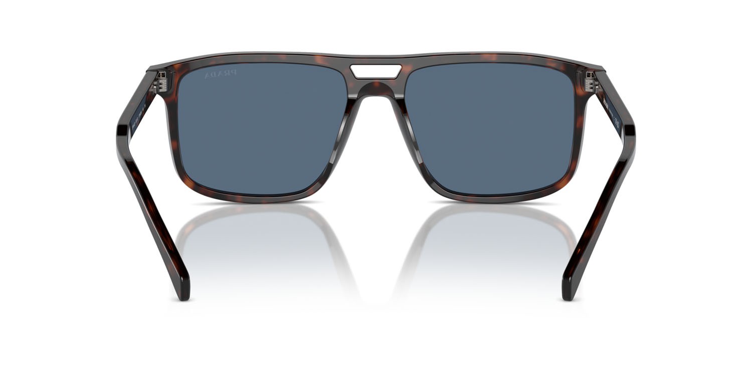 Occhiali da sole Prada PR A22S (17N06A) colore radica tortoise forma rettangolare lenti blu scuro