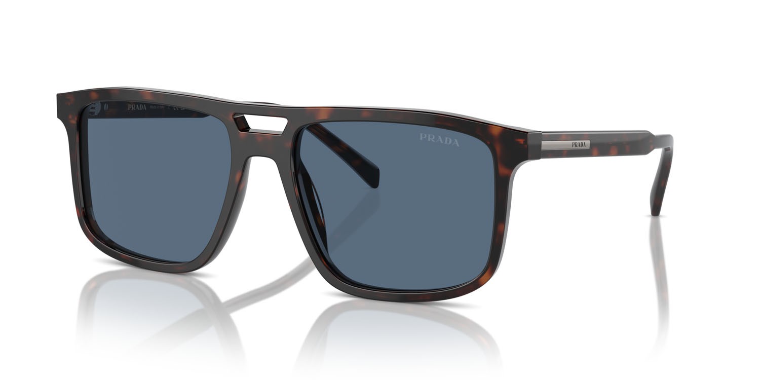 Occhiali da sole Prada PR A22S (17N06A) colore radica tortoise forma rettangolare lenti blu scuro