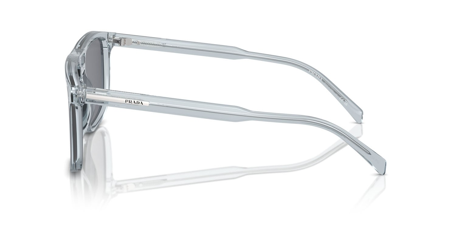 Occhiali da sole Prada PR A22S (19T175) colore azzurro trasparente forma rettangolare lenti grigio scuro/flash argento