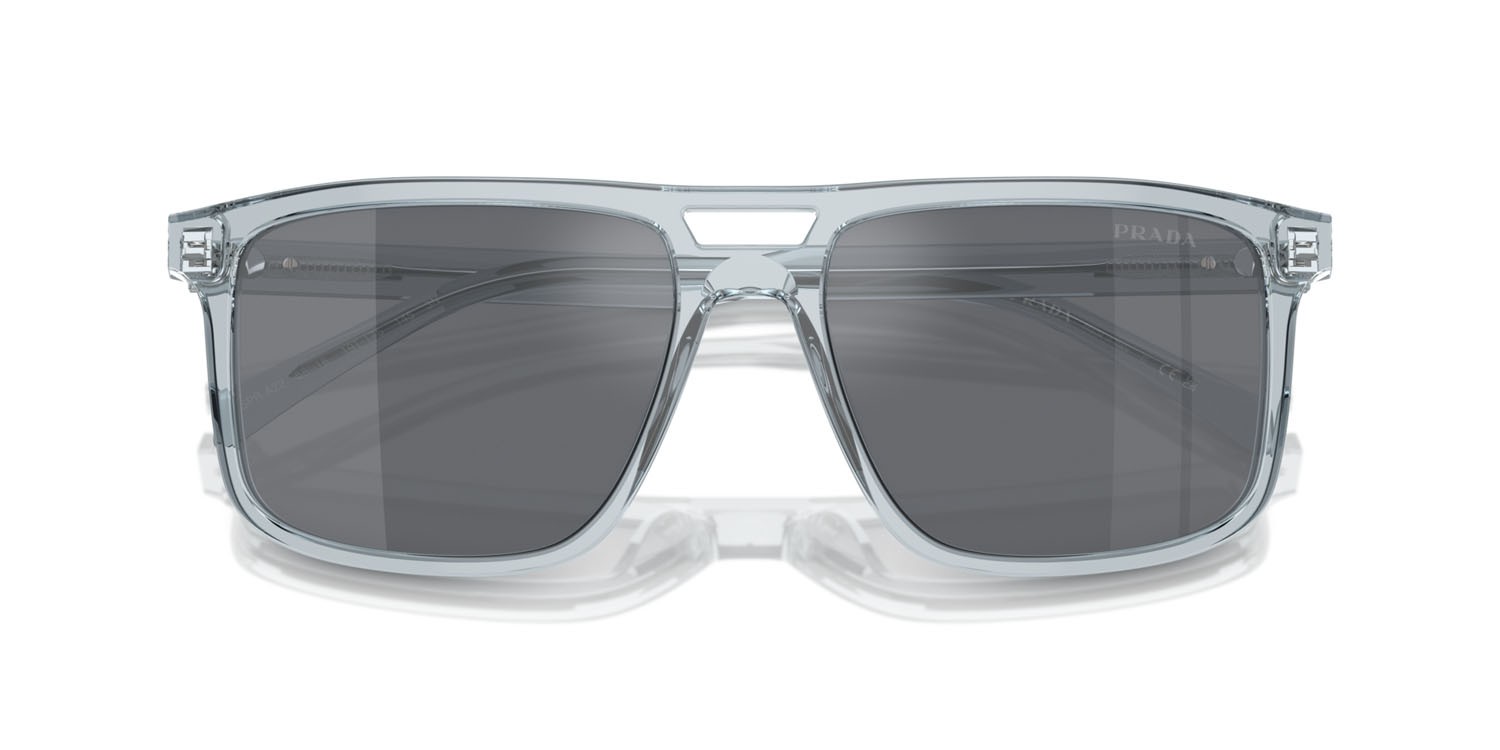 Occhiali da sole Prada PR A22S (19T175) colore azzurro trasparente forma rettangolare lenti grigio scuro/flash argento