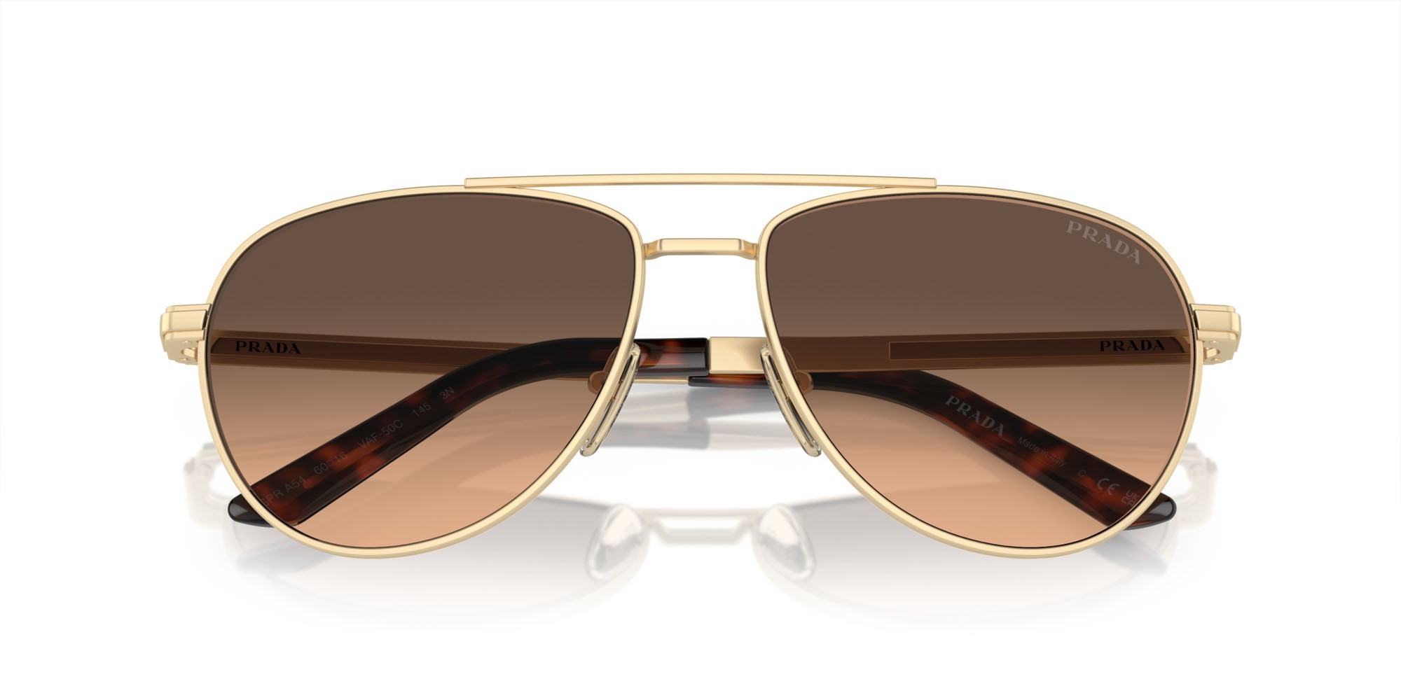 Occhiali da sole Prada PR A54S (VAF50C) colore oro pallido opaco forma aviator lenti marrone sfumato grigio