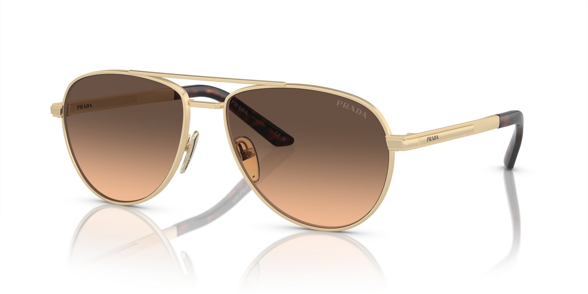 Occhiali da sole Prada PR A54S (VAF50C) colore oro pallido opaco forma aviator lenti marrone sfumato grigio