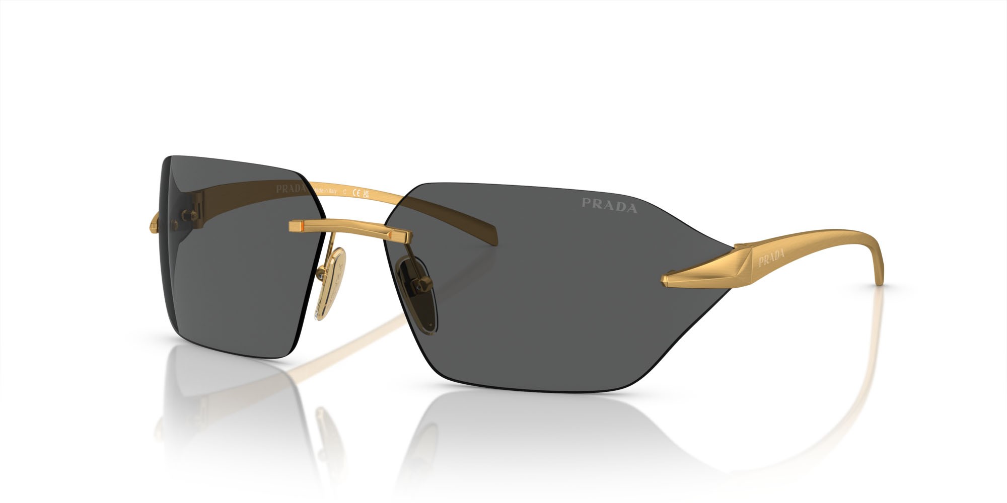 Sunglasses Prada PR A55S (15N5S0) color oro giallo satinato shape irregular lenses grigio scuro