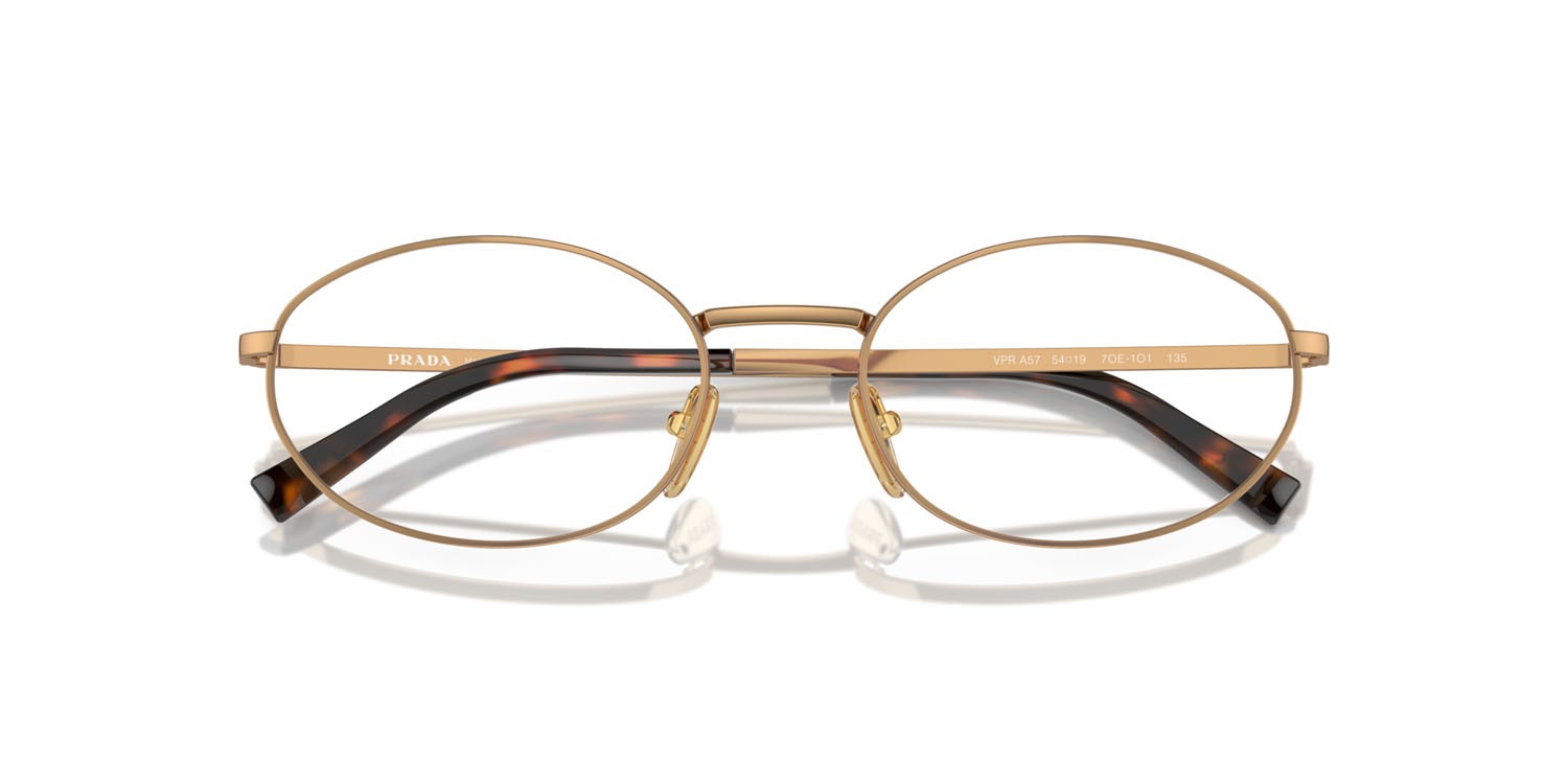 Eyeglasses Prada PR A57V (7OE1O1) color ottone shape oval lenses lente demo