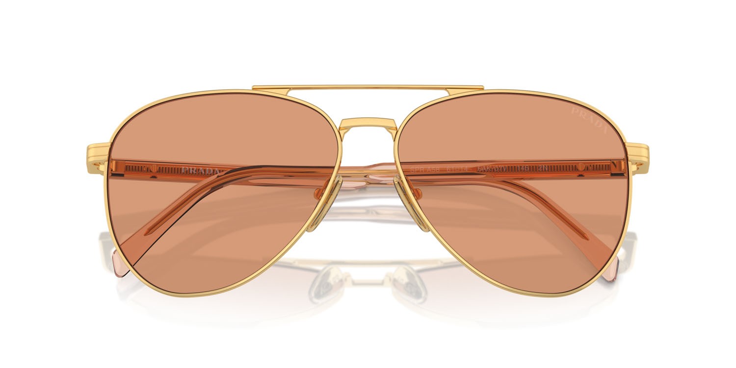 Occhiali da sole Prada PR A58S (5AK07V) colore oro forma aviator lenti arancione