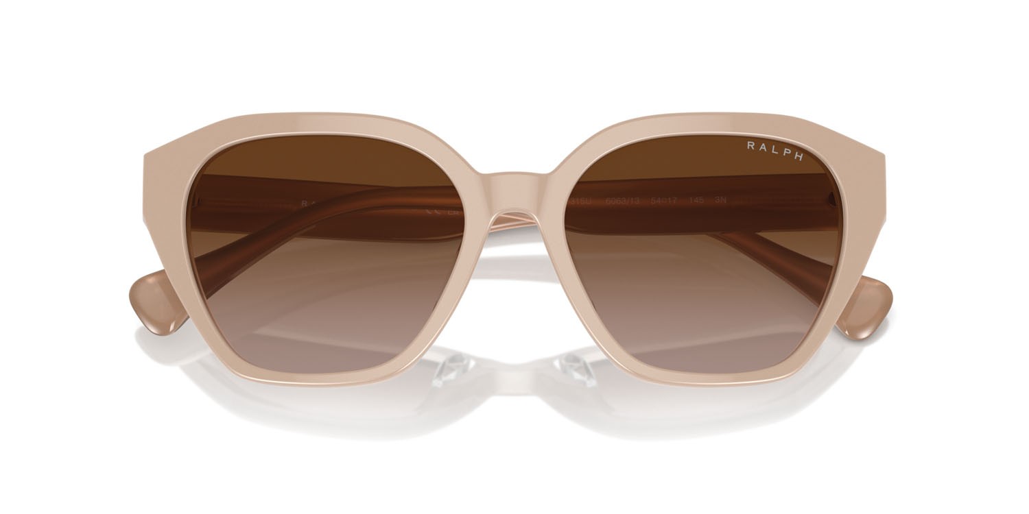 Sunglasses Ralph RA 5315U (606313) color shiny beige on milky beige shape cat eye lenses marrone sfumato