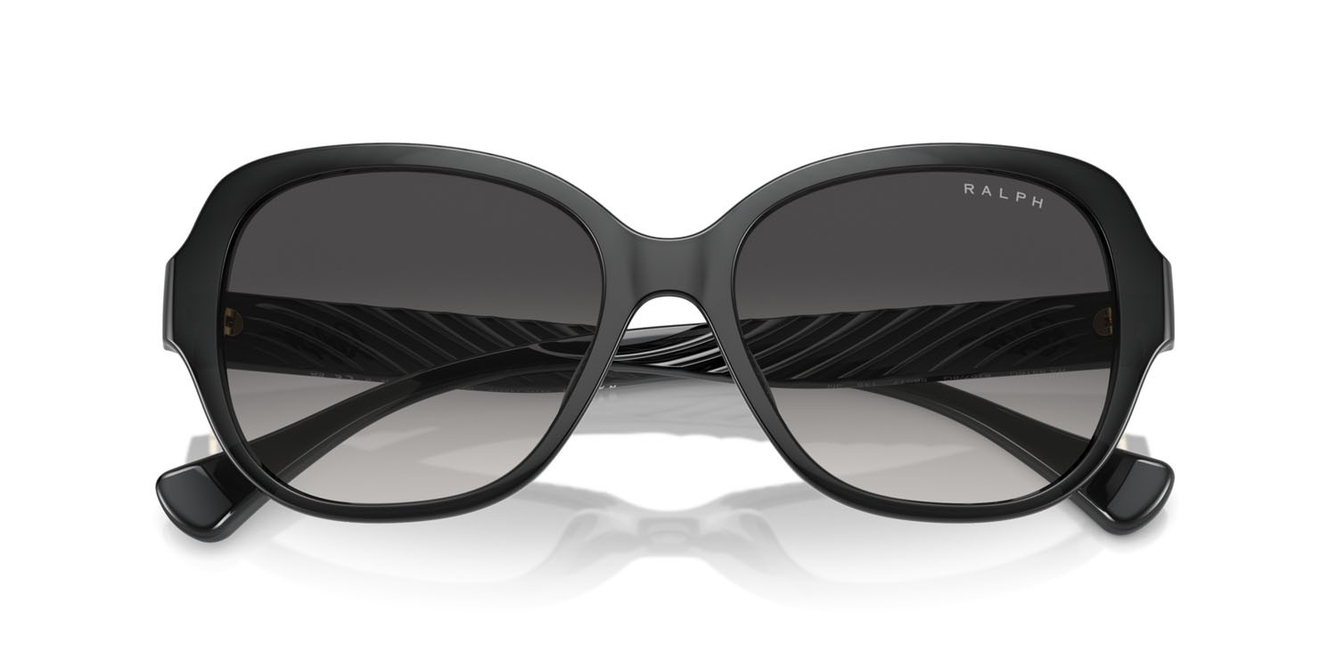 Occhiali da sole Ralph RA 5316U (61578G) colore shiny transparent black forma rotondo lenti grigio sfumato