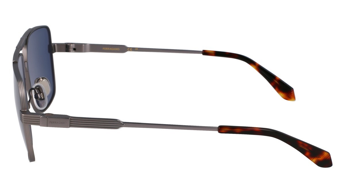 Occhiali da sole Salvatore Ferragamo SF318S (021) colore matte light ruthenium forma navigator lenti solid blue