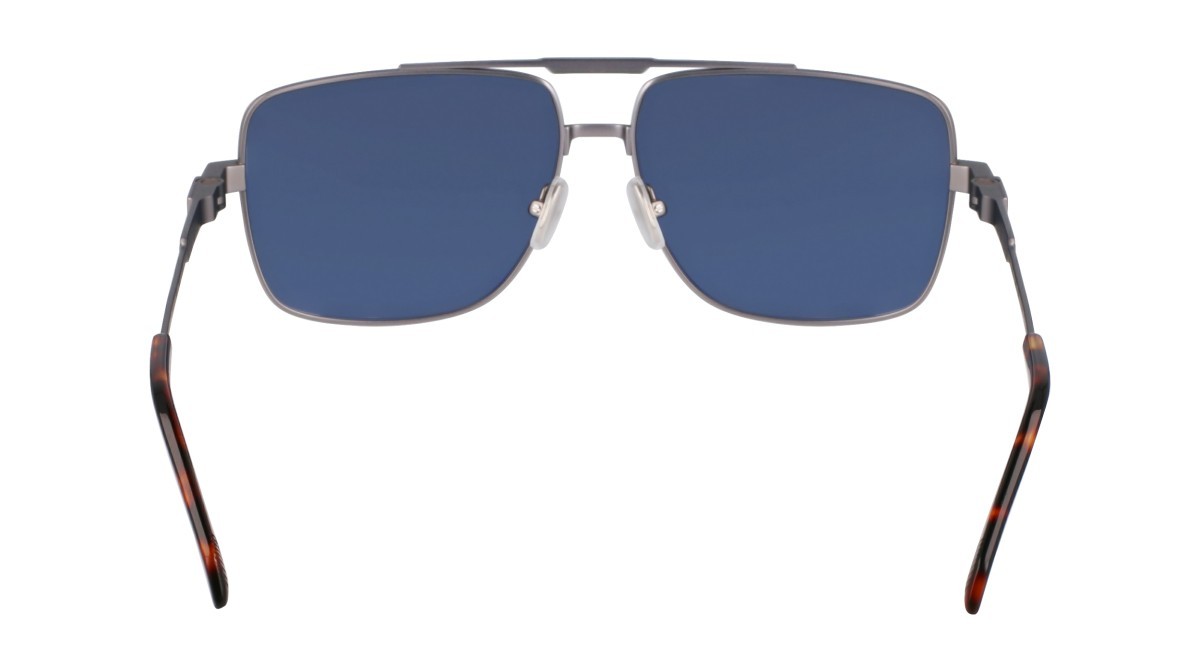 Occhiali da sole Salvatore Ferragamo SF318S (021) colore matte light ruthenium forma navigator lenti solid blue