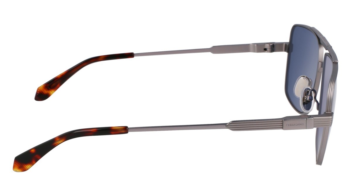Occhiali da sole Salvatore Ferragamo SF318S (021) colore matte light ruthenium forma navigator lenti solid blue