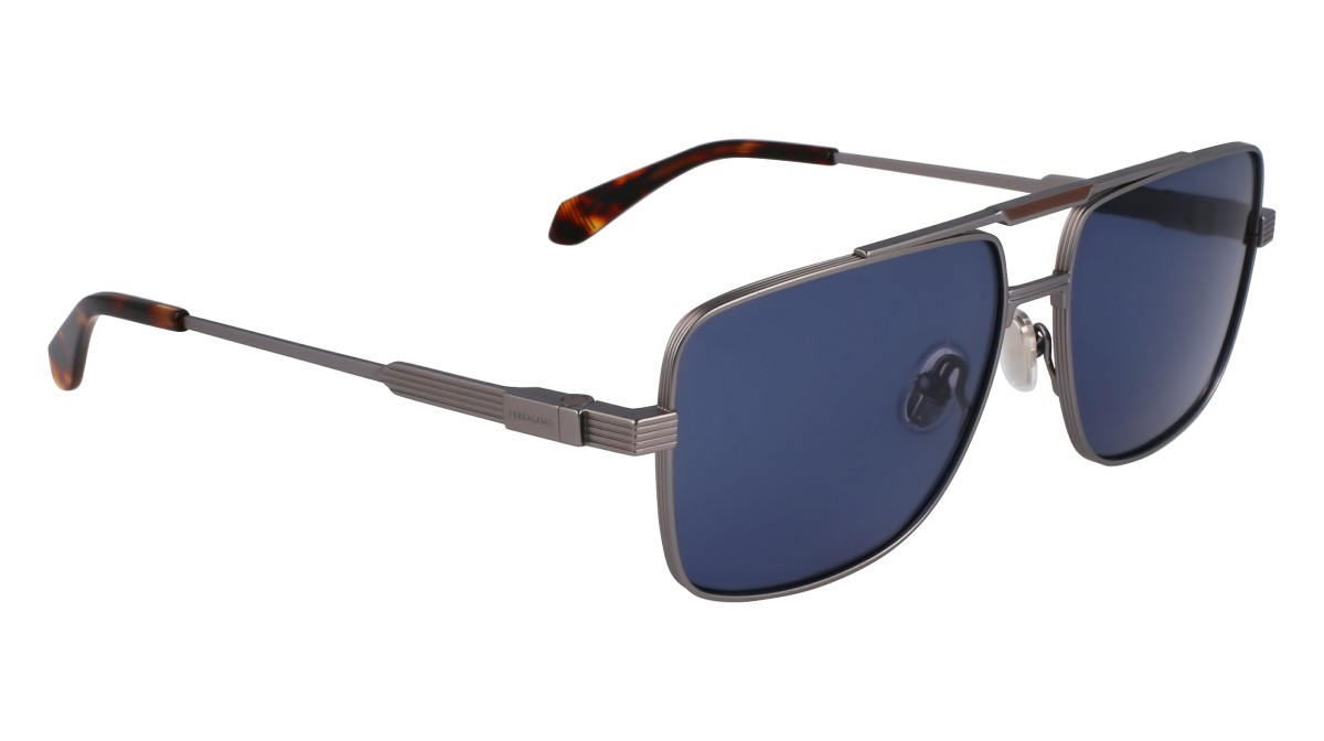 Occhiali da sole Salvatore Ferragamo SF318S (021) colore matte light ruthenium forma navigator lenti solid blue