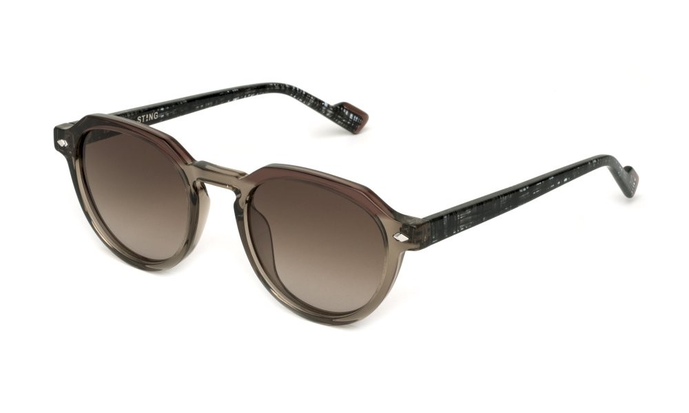 Occhiali da sole Sting SST521 (0913) colore beige trasparente lucido lenti brown gradient brown