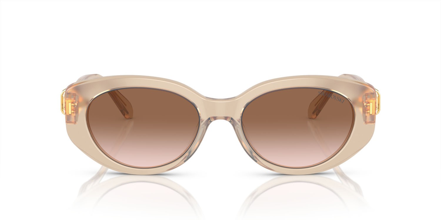 Sunglasses Swarovski SK 6002 (103413) color beige trasparente shape oval lenses marrone sfumato