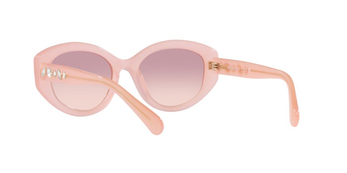 Occhiali da sole Swarovski SK 6005 (102568) colore rosa opalino forma irregolare lenti marrone sfumato violetto