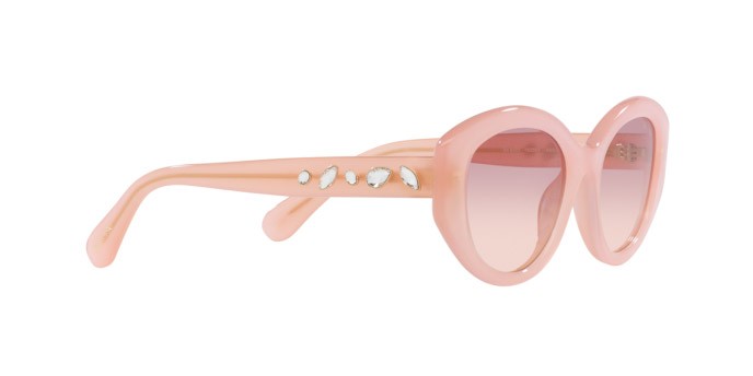 Occhiali da sole Swarovski SK 6005 (102568) colore rosa opalino forma irregolare lenti marrone sfumato violetto