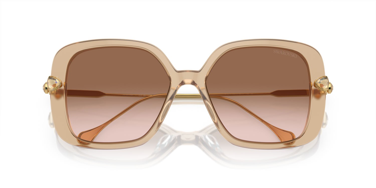 Occhiali da sole Swarovski SK 6011 (103413) colore beige trasparente forma quadrato lenti marrone sfumato