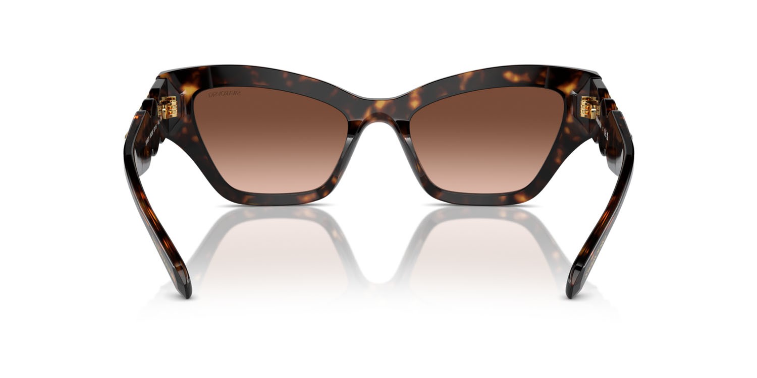 Occhiali da sole Swarovski SK 6021 (10023B) colore havana forma irregolare lenti marrone sfumato