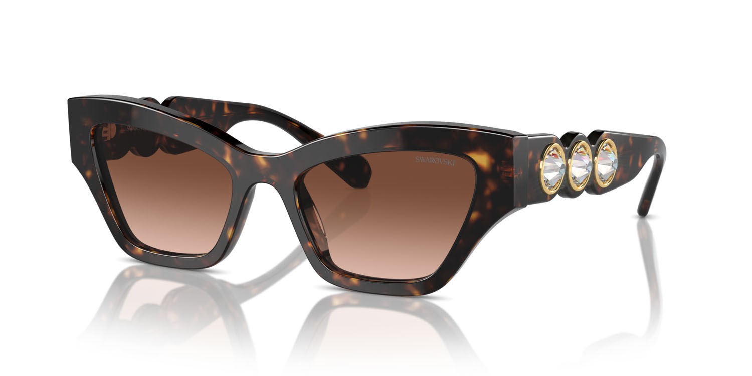 Occhiali da sole Swarovski SK 6021 (10023B) colore havana forma irregolare lenti marrone sfumato