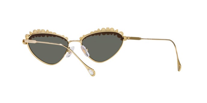 Sunglasses Swarovski SK 7009 (40137P) color oro pallido shape irregular lenses marrone specchiato oro