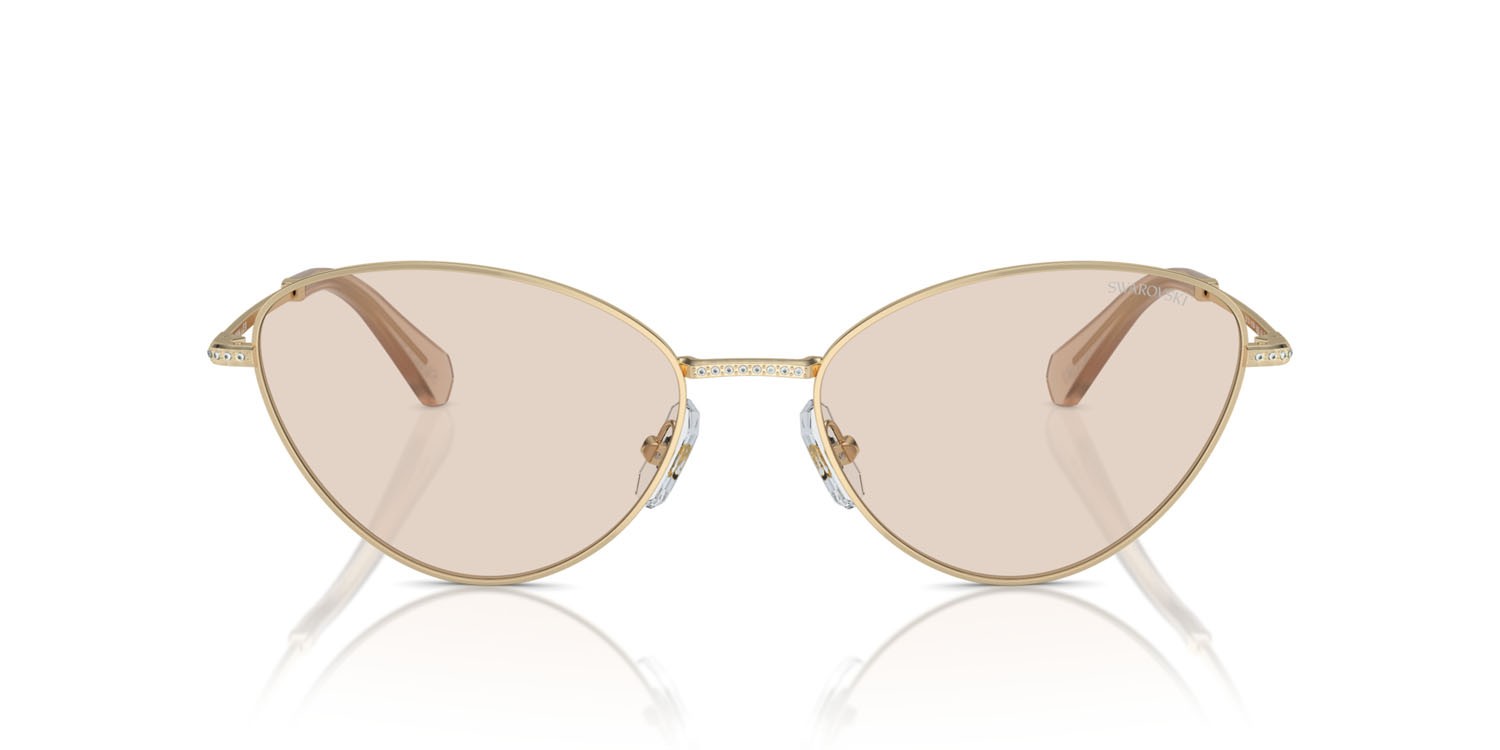 Occhiali da sole Swarovski SK 7014 (4013M4) colore oro pallido forma cat eye lenti fotocromatica marrone