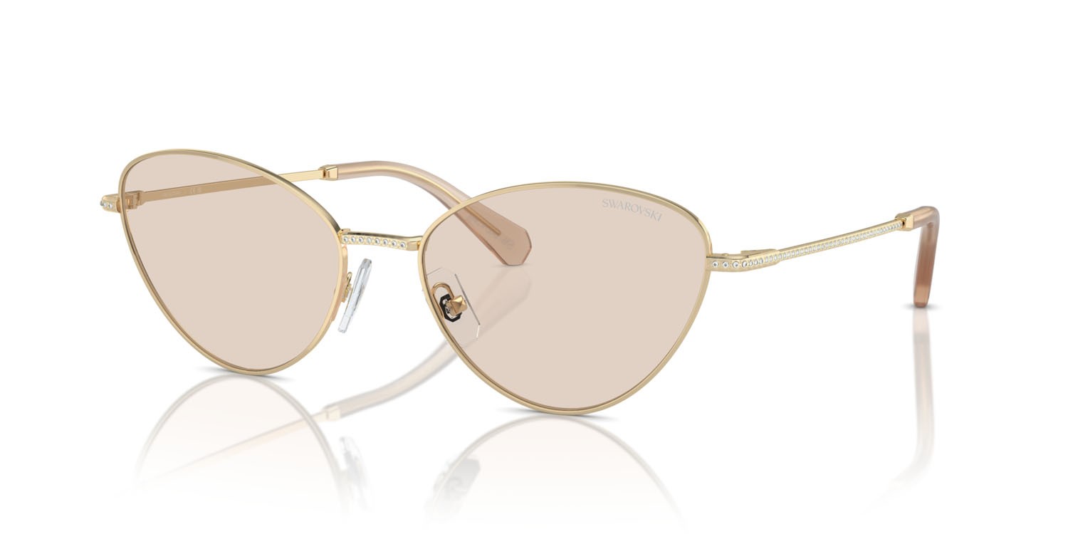 Occhiali da sole Swarovski SK 7014 (4013M4) colore oro pallido forma cat eye lenti fotocromatica marrone
